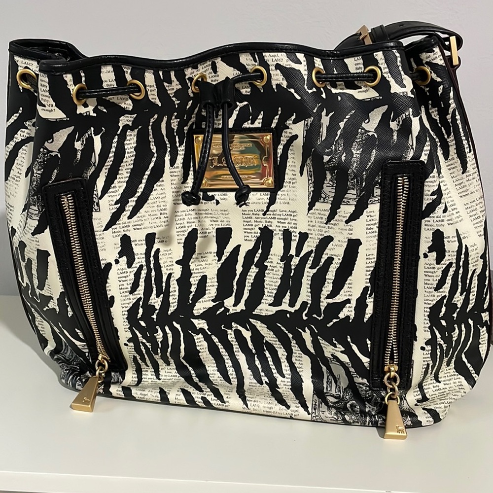 L.A.M.B. Bucket bag. GUC.